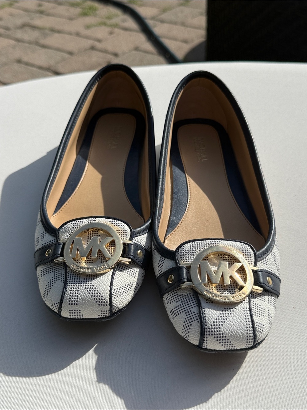 Michael Kors Cream Logo-Emblem Ballet Flats with Black Trim